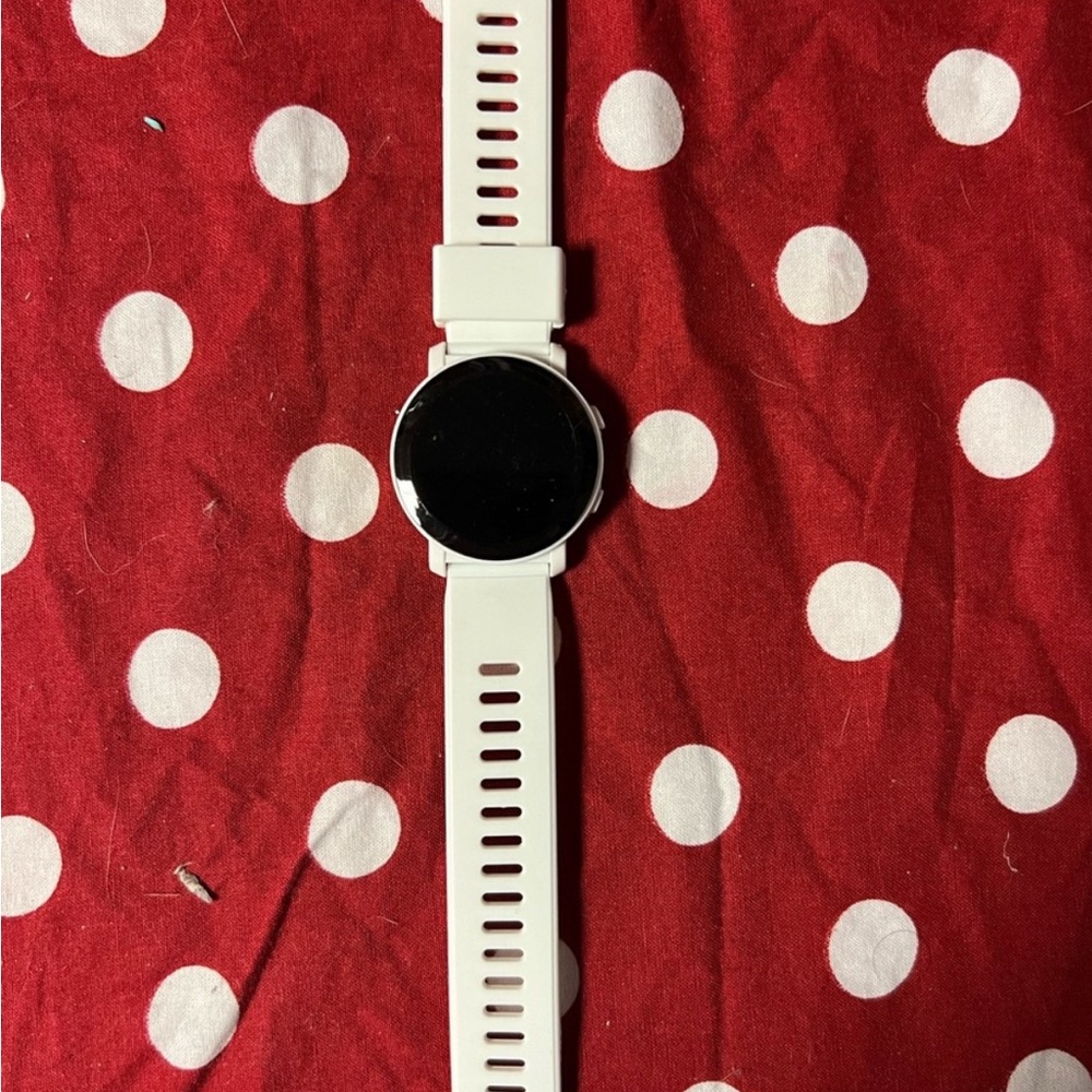 White Circular Smartwatch with Textured Band